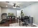 Home office with hardwood floors, ceiling fan, desk, and treadmill at 5501 N 1St St, Phoenix, AZ 85012