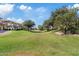Well maintained community green space with mature trees and landscaping at 5828 E Hampton Ave, Mesa, AZ 85206