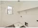 Laundry room with tile flooring, utility hookups, and a window at 5828 E Hampton Ave, Mesa, AZ 85206