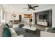 Open-concept living area boasts a modern design with seamless flow to the kitchen and dining spaces at 5828 E Hampton Ave, Mesa, AZ 85206