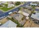 Aerial view of the property features a gravel front yard, shrubs, and a well maintained roof at 660 E 1St Ave, Mesa, AZ 85204