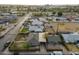 This aerial view shows a charming neighborhood with mature landscaping and well-maintained homes at 660 E 1St Ave, Mesa, AZ 85204