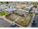 Aerial view displaying the layout of the house, driveway, and enclosed yard space at 660 E 1St Ave, Mesa, AZ 85204