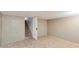 Finished basement space with tile floors and stairs provides room for storage or a den at 660 E 1St Ave, Mesa, AZ 85204