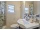 Modest bathroom featuring a unique sink and patterned shower curtain at 660 E 1St Ave, Mesa, AZ 85204