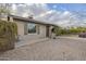 Charming single-story home with gravel front yard and manicured shrubbery, offering great curb appeal at 660 E 1St Ave, Mesa, AZ 85204