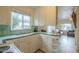 Bright and sunny kitchen with ample countertop space and natural light at 660 E 1St Ave, Mesa, AZ 85204