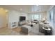 Bright living room featuring a comfortable seating area with large windows and modern decor at 660 E 1St Ave, Mesa, AZ 85204