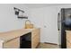 A bright kitchen featuring wood-tone cabinets, gold faucet, and modern sink at 805 N 4Th Ave # 507, Phoenix, AZ 85003