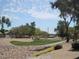 Scenic community park featuring lush landscaping, walking paths, and open green spaces for outdoor activities at 8179 W Clara Ln, Peoria, AZ 85382