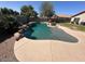 Backyard pool area with desert landscaping at 8179 W Clara Ln, Peoria, AZ 85382