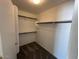 A walk-in closet with carpet and shelves at 8179 W Clara Ln, Peoria, AZ 85382