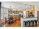 Spacious kitchen featuring granite countertops, stainless steel appliances and hardwood floors at 9264 E Hillery Way, Scottsdale, AZ 85260