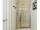 Modern bathroom showcasing a sleek glass-enclosed shower, offering a refreshing and stylish bathing experience at 9264 E Hillery Way, Scottsdale, AZ 85260