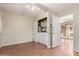 A functional laundry area featuring a washer, dryer, storage shelves, and access to the rear patio at 9730 W Gulf Hills Dr, Sun City, AZ 85351