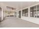 Covered sunroom with screened windows providing ample space for outdoor living and relaxation at 9730 W Gulf Hills Dr, Sun City, AZ 85351
