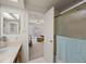 Bathroom with a single sink vanity and shower/tub combo at 1005 W Berridge Ln, Phoenix, AZ 85013