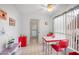 Cozy dining area with a vintage table set and bright natural light, perfect for casual meals at 1005 W Berridge Ln, Phoenix, AZ 85013