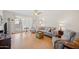 Cozy living room featuring a ceiling fan and access to the sunroom at 1005 W Berridge Ln, Phoenix, AZ 85013