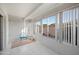 Bright sunroom with ceramic tile, large windows, and a seating area at 1005 W Berridge Ln, Phoenix, AZ 85013