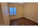 Bedroom with ceiling fan and a window providing natural light at 10382 W Cashman Dr, Peoria, AZ 85383