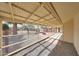 A covered patio overlooks the backyard with desert landscaping at 11067 W White Mountain Rd, Sun City, AZ 85351