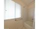 Bathroom featuring natural light with accessibility features at 11067 W White Mountain Rd, Sun City, AZ 85351