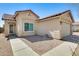 Charming single-story home featuring desert landscaping and a quaint front entry at 11229 E Emelita Ave, Mesa, AZ 85208