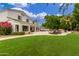 Sprawling backyard with lush landscaping, outdoor dining, a pool, and a serene setting, perfect for relaxation at 1152 W Sunrise Pl, Chandler, AZ 85248