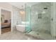 Luxurious bathroom features a standalone tub, a glass shower, and stylish lighting at 1152 W Sunrise Pl, Chandler, AZ 85248