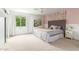 Charming bedroom with pink accents, a tufted headboard, and a large window at 1152 W Sunrise Pl, Chandler, AZ 85248