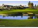 Beautiful view of the lush green golf course with water feature in a premier community at 1152 W Sunrise Pl, Chandler, AZ 85248