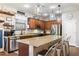 Spacious kitchen featuring a large island and stainless steel appliances at 12132 W Daley Ln, Sun City, AZ 85373