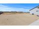 Large side yard featuring desert landscaping and a block privacy wall around the perimeter at 12204 W Blackhawk Rd, Casa Grande, AZ 85194