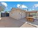 Back exterior featuring outdoor dining and cooking area and an attached covered patio at 13202 N 22Nd Ave, Phoenix, AZ 85029