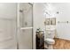 Bathroom boasts a glass shower, tiled floor, and bright vanity area for a clean, modern look at 13202 N 22Nd Ave, Phoenix, AZ 85029