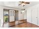 Bright entryway with a glass door, multiple windows, and modern light-colored walls at 13202 N 22Nd Ave, Phoenix, AZ 85029