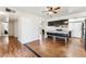 Open floor plan with stylish flooring and a modern kitchen featuring black cabinets at 13202 N 22Nd Ave, Phoenix, AZ 85029