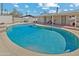 Inviting pool surrounded by a concrete deck and an enclosed patio at 13202 N 22Nd Ave, Phoenix, AZ 85029