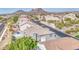 Scenic aerial view of a neighborhood with mountain views, mature trees, and diverse home styles at 13236 N 13Th St, Phoenix, AZ 85022