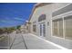 Expansive balcony featuring stucco exterior, French doors, and views of the neighborhood at 13236 N 13Th St, Phoenix, AZ 85022