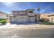 Beautiful home with a three-car garage, manicured lawn, and desert landscaping at 13236 N 13Th St, Phoenix, AZ 85022