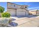 Elegant two-story home boasting a three-car garage and well-maintained landscaping at 13236 N 13Th St, Phoenix, AZ 85022