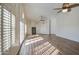 Spacious primary bedroom with a ceiling fan, vaulted ceiling, and fireplace at 13236 N 13Th St, Phoenix, AZ 85022