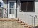 A brick staircase leading up to the door at 1478 W Blackfoot Ave, Apache Junction, AZ 85119