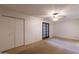 Bedroom featuring carpet, wood doors and a ceiling fan at 16402 N 31 St # 122, Phoenix, AZ 85032