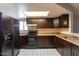 Fully-equipped kitchen with stainless steel appliances and ample countertop space at 16402 N 31 St # 122, Phoenix, AZ 85032