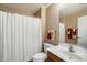 Cozy bathroom with a shower, toilet, vanity, and mirror at 16800 E El Lago Blvd # 2062, Fountain Hills, AZ 85268