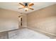 Bedroom featuring ceiling fan, carpet, neutral walls, and a view leading to other rooms at 16800 E El Lago Blvd # 2062, Fountain Hills, AZ 85268