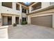 Multi-level exterior with private garage and entryway to the unit at 16800 E El Lago Blvd # 2062, Fountain Hills, AZ 85268